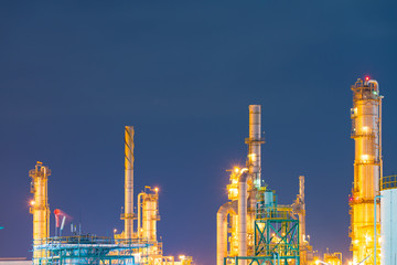 Oil and gas refinery plant area at twilight