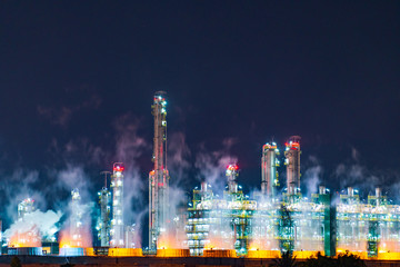 Plakat Oil and gas refinery plant area at twilight