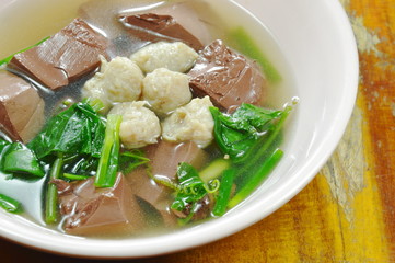 boiled pork blood with vegetable gourd and minced pork soup on bowl