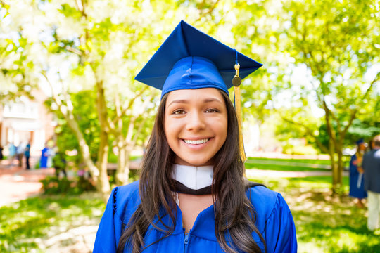 Beautiful Female College Graduate In Cap And Gown