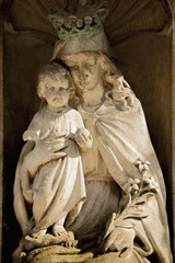 Fragment of ancient statue of the Virgin Mary with the baby Jesus Christ (Religion, faith, eternal life, God concept)