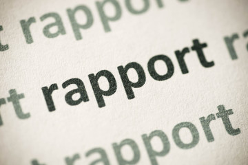 word rapport printed on paper macro