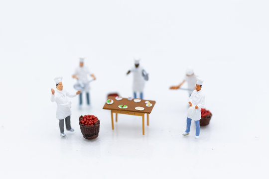 Miniature people: Chefs choose best raw materials for cooking for consumers. Image use for food and beverage concept, business concept.