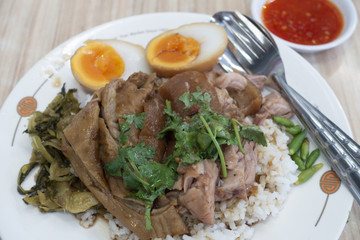 Pig leg with rice very famous of Thai street food.