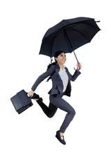 Happy businesswoman holds umbrella on studio