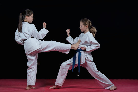 Children are training karate blows