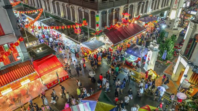 4k Timelapse of People in China town street, Singapore, have many shops and tourism walking for shopping.