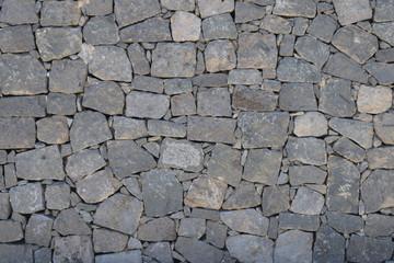 Textura pared piedras grandes gris