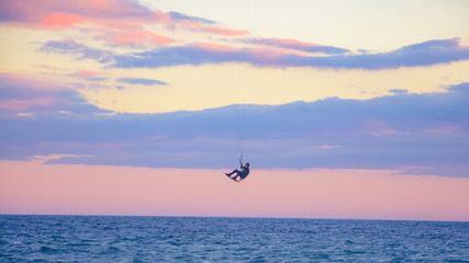 Fototapeta premium jumping in the air in a kite session in Marbella