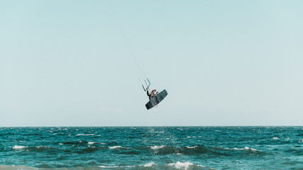 kiter jumping with a trick in Marbella