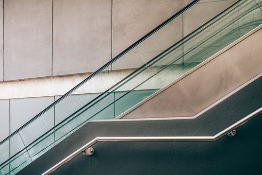 Closeup Of Escalator And Handrail - Geometric Architecturall Detail