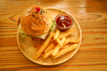 hamburger and chip tomato ketchup dip on wood table