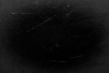 abstract distressed decor background. textured black scratched plaster design. vignette effect. copyspace concept