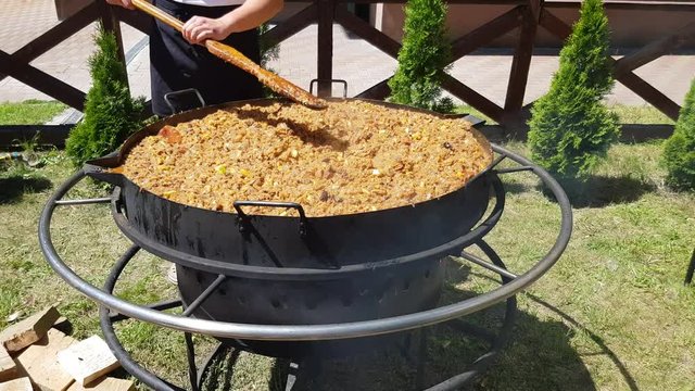 biogas is the traditional Polish food. hot dish in a large saucepan. catering in the open air