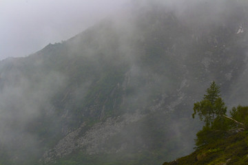Awesome misty mountains view. I take this capture after many hour of walking. It was an apparentrly sunny day