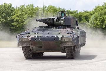 German infantry fighting vehicle drives on a street