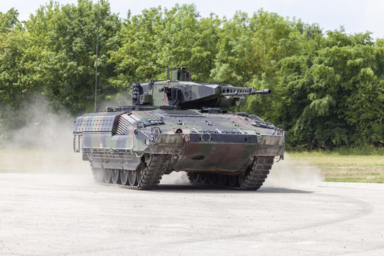 German infantry fighting vehicle drives on a street