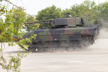 German infantry fighting vehicle drives on a street