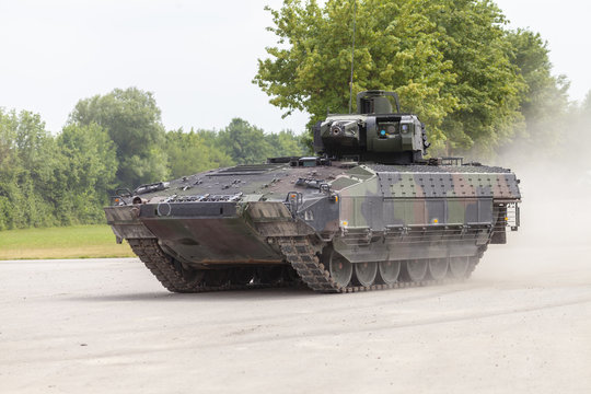 German infantry fighting vehicle drives on a street