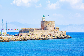 The medieval Fortress Agios Nikolaos on Rhodes Island, Rhodes Town and Mandraki Harbour, Mediterranean Sea, Greece