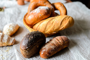 Fototapeta na wymiar Still life of bread products. Freshly baked