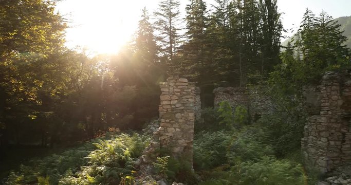 Zeda-gordi, Georgia. Remains Of Palace Of Princes Of 18 Century In Park Dadiani In Canyon Okatse In Sunset Or Sunrise Time. Sun Sunshine With Natural Sunlight And Sun Rays Through Trees