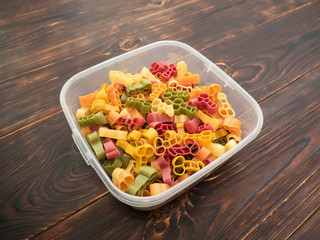 Italian multicolored paste of unusual shape and food container