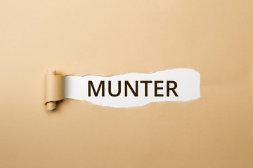 MUNTER Schriftzug - aufgerissenes Papier