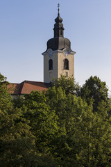 Fototapeta na wymiar The Ozalj church bell tower. Church is located on top of the hill.