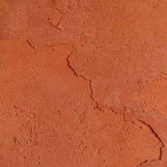 Red rough stone texture background. Material construction and architectural detail.
