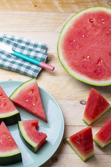 watermelon pieces in a wooden background