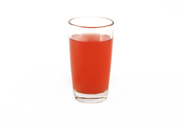 Fresh grapefruit juice with mint in a glass cup isolated on white background. Grapefruit fresh and juice on a white background, view of the shu, cospore space