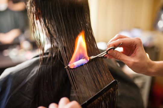 Fire Hair Treatment In The Beauty Salon.