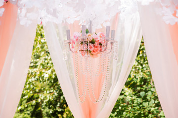 Beautiful wedding decorations and Arch of flowers. Stylish wedding.
