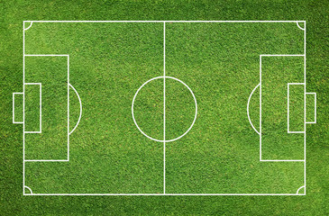 Fototapeta na wymiar Football field or soccer field with green grass pattern and texture background.