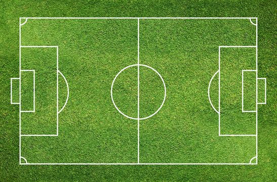 Football field or soccer field with green grass pattern and texture background.
