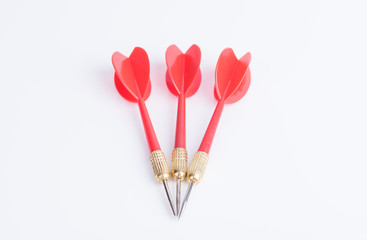 Three red darts on a white background