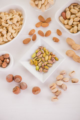 healthy snack selection on white wood background