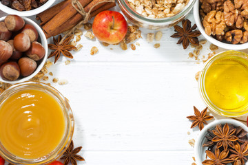 white background and ingredients for baking apples, top view