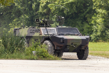 German light armoured  reconnaissance vehicle drives on a road