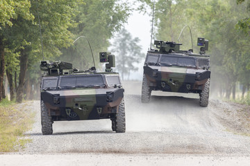 German light armoured  reconnaissance vehicle drives on a road