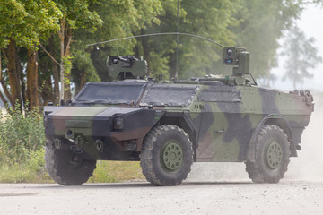 German light armoured  reconnaissance vehicle drives on a road