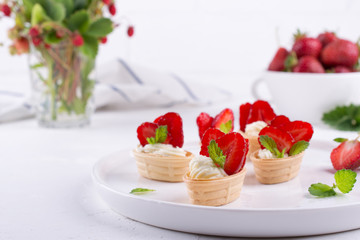 Fresh and tasty  snack  with cream cheese  fruits and berries. Strawberries time