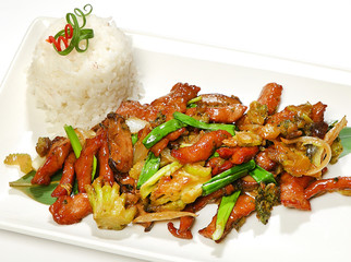 Pork Indonesian (pork with shiitake mushrooms, broccoli, celery, onions, sesame, oyster sauce, garnished with rice)