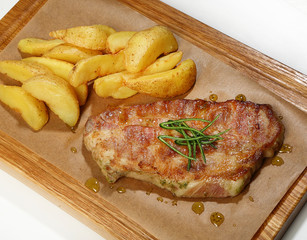 Pork steak (pork neck with potato slices)