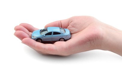 Hand and toy car isolated