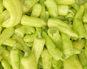 organic green peppers top view, food background