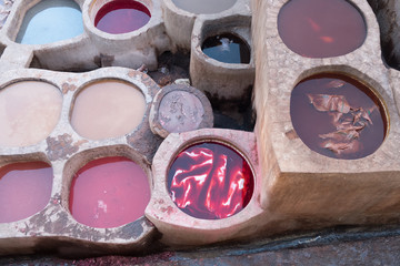 Leather dying in a traditional tannery in  Morocco