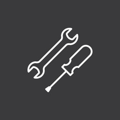 line wrench and screwdriver icon on dark background