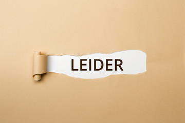 LEIDER Schriftzug - aufgerissenes Papier